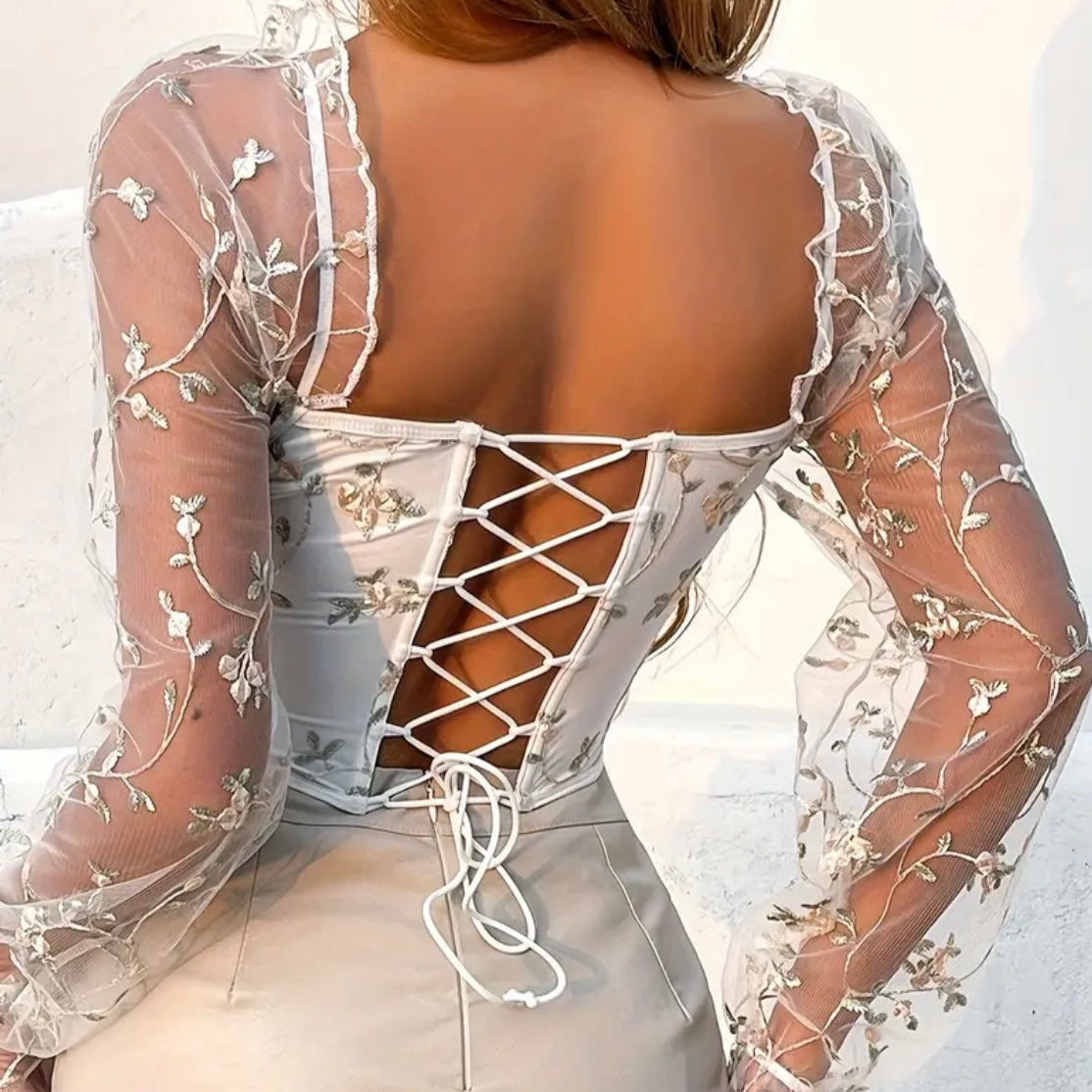Corset con mangas